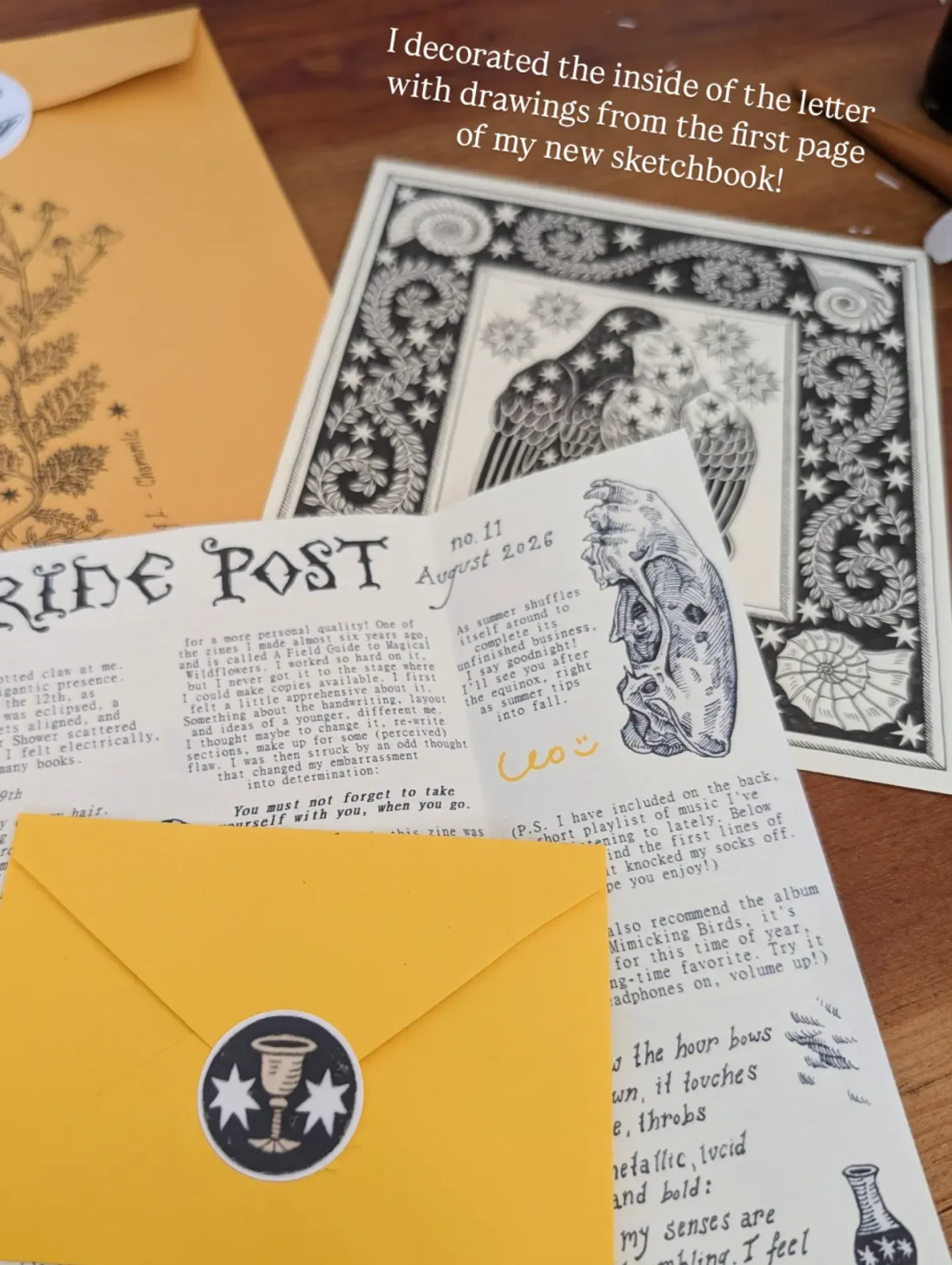 A Peregrine Post letter with drawings beside a mustard-yellow envelope and a black-and-white illustrated sheet.