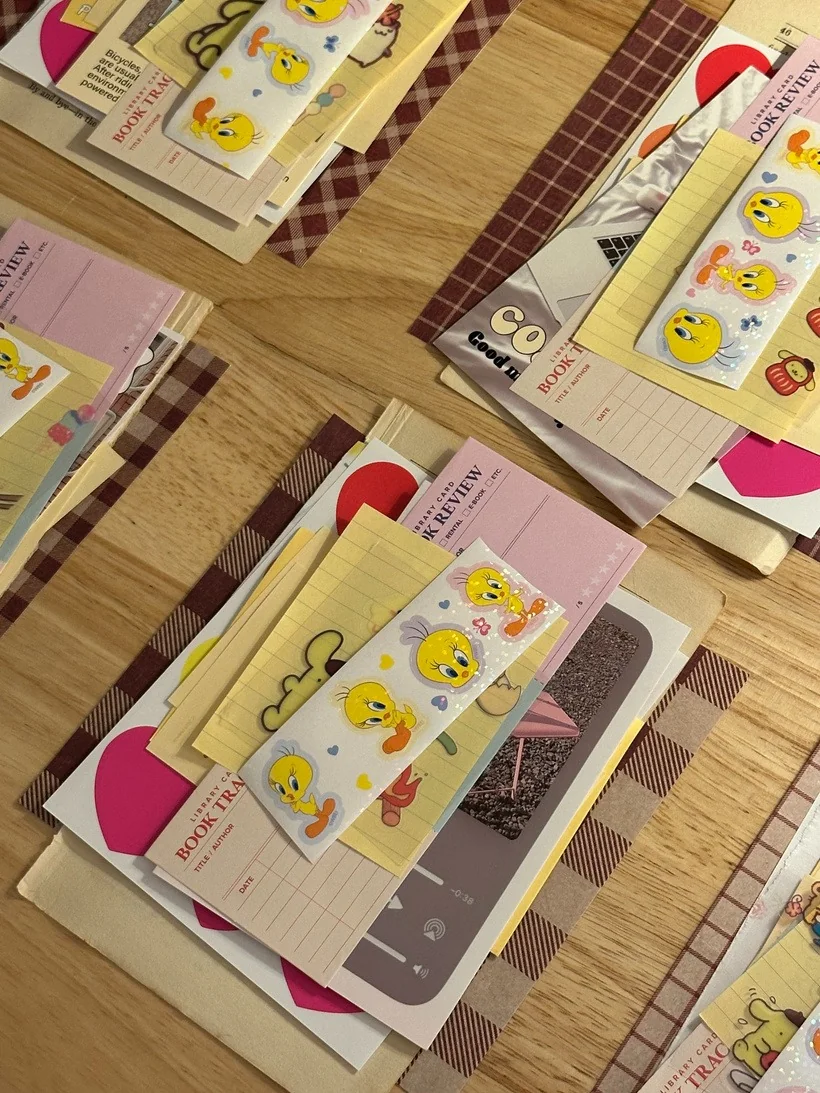July bundles with library cards, yellow memo paper, and Tweety stickers