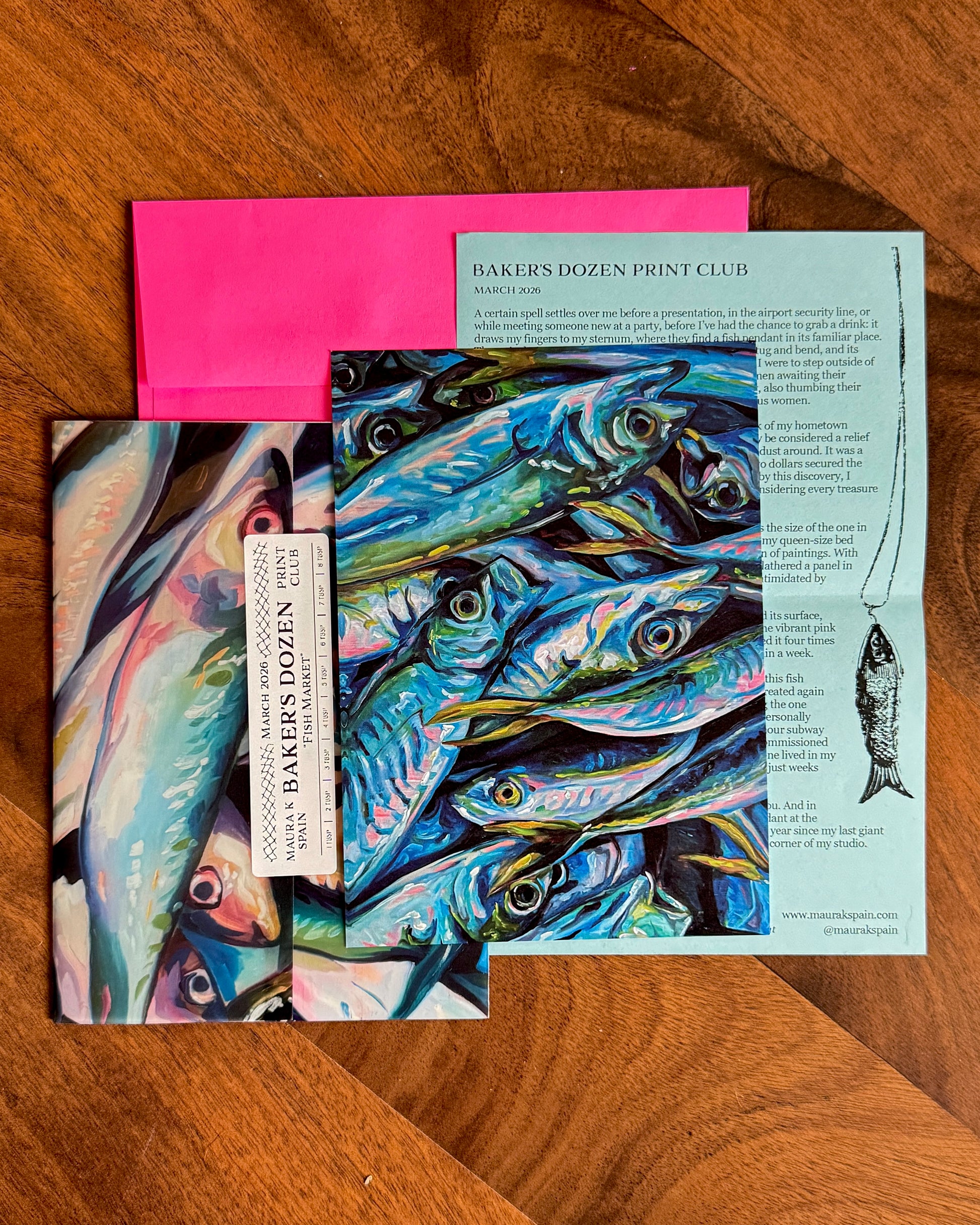 March 2026 fish art print with a personal letter, illustrated paper sleeve and pink envelope
