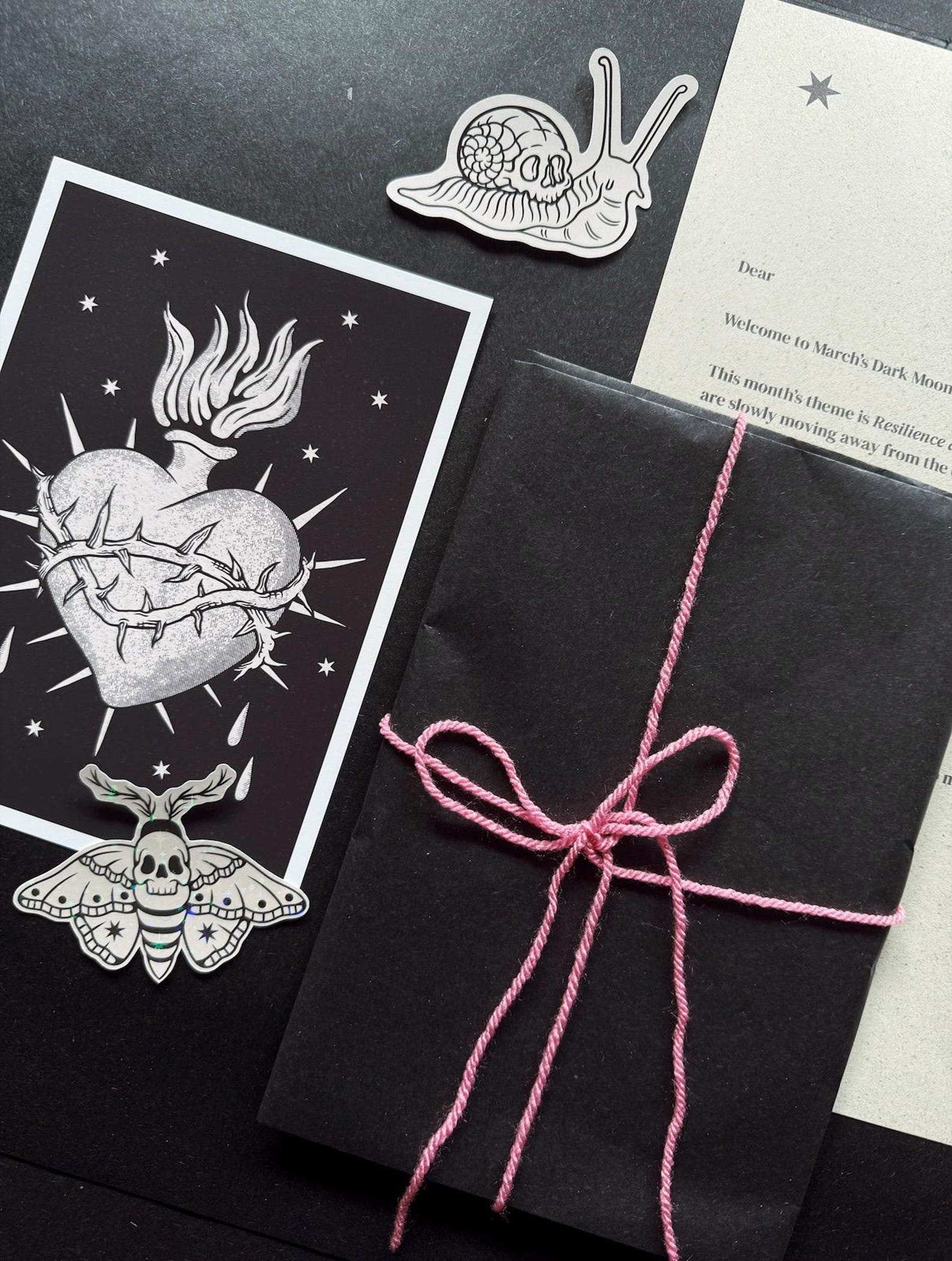 Dark Moon Snail Mail Club — March edition — sacred heart print, moth sticker, letter and wrapped mail