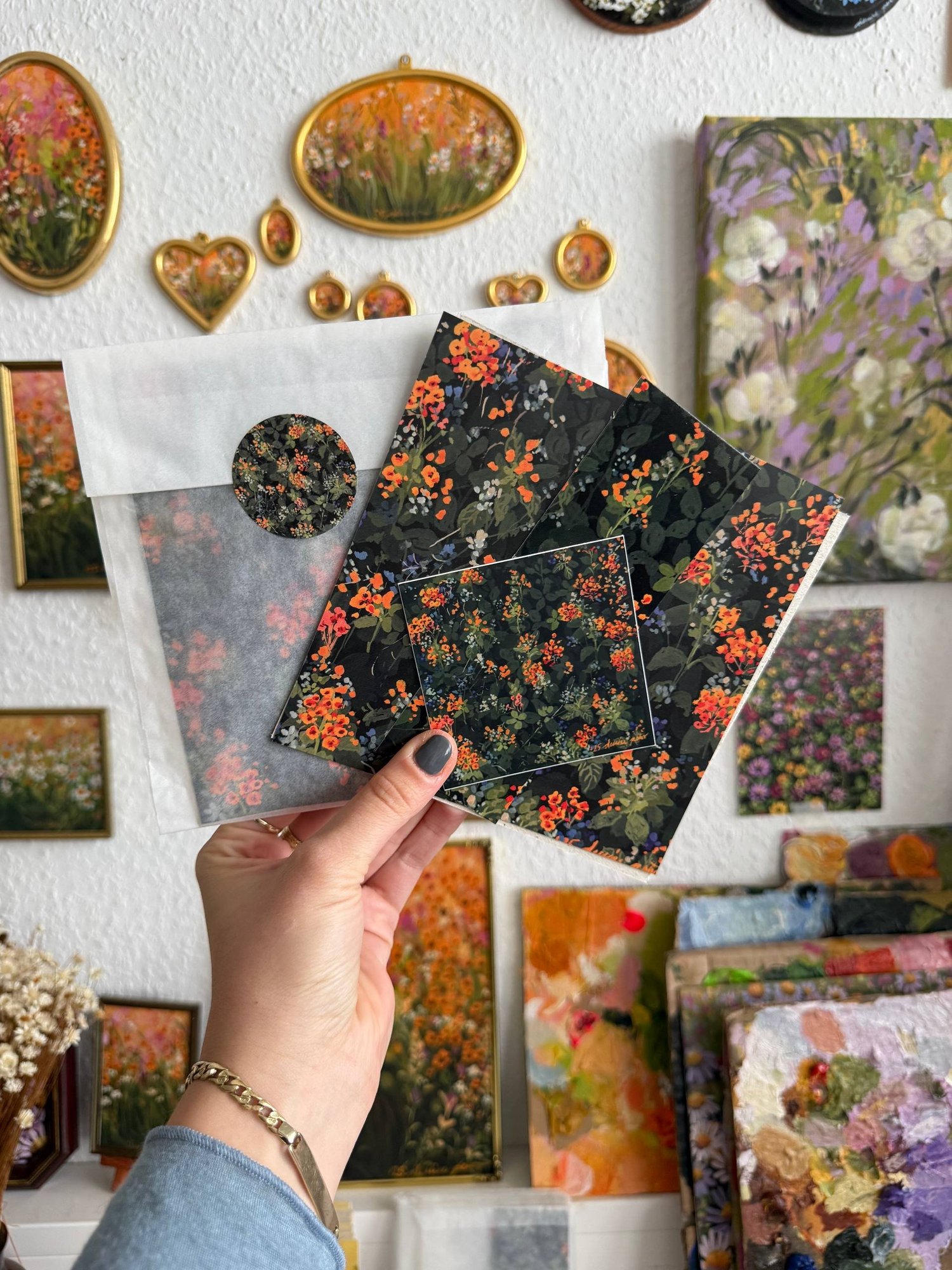 Denise Peter orange-flower print, bookmark, sticker, and glassine wrapping