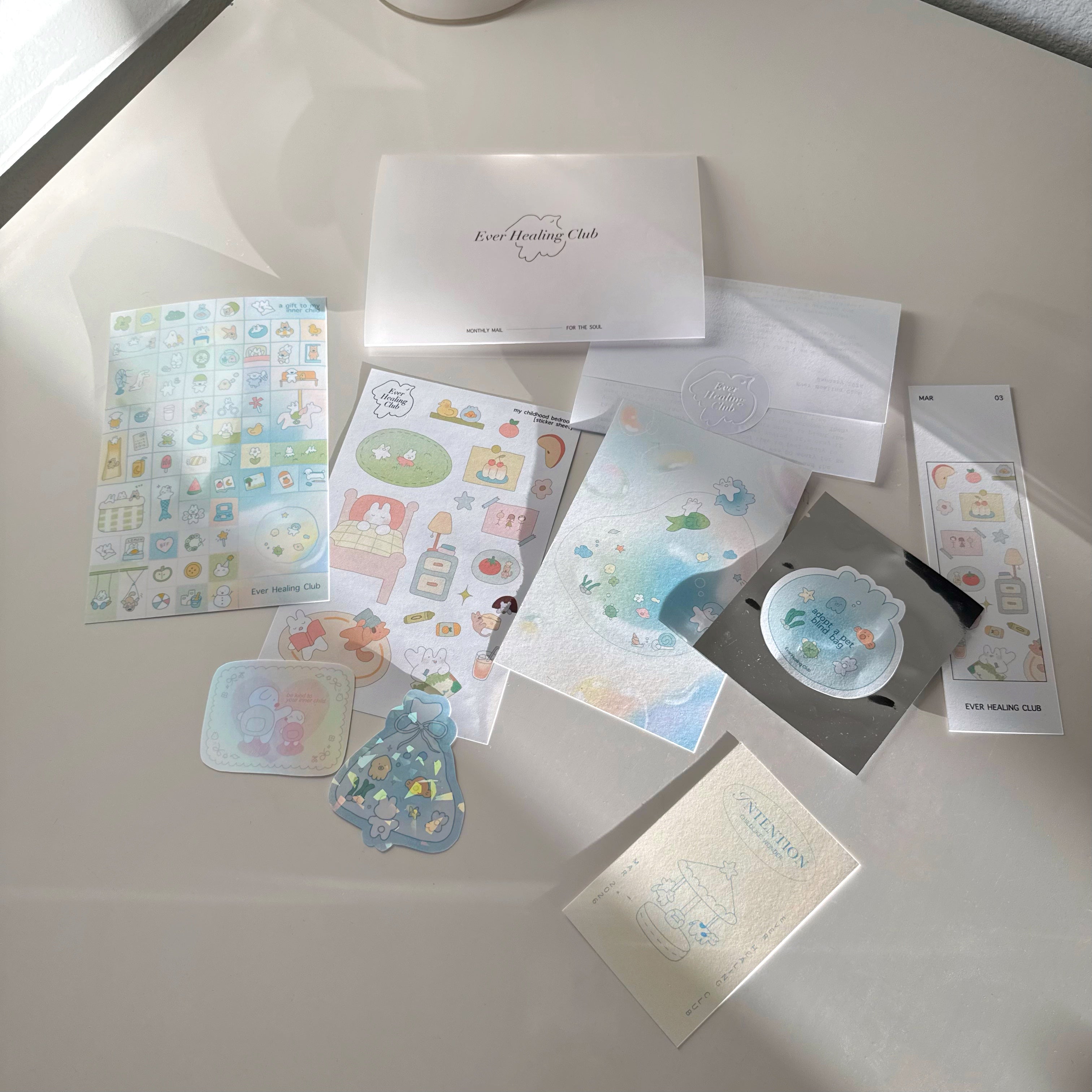 Ever Healing Club: March Signature edition with childhood-inspired art and stationery