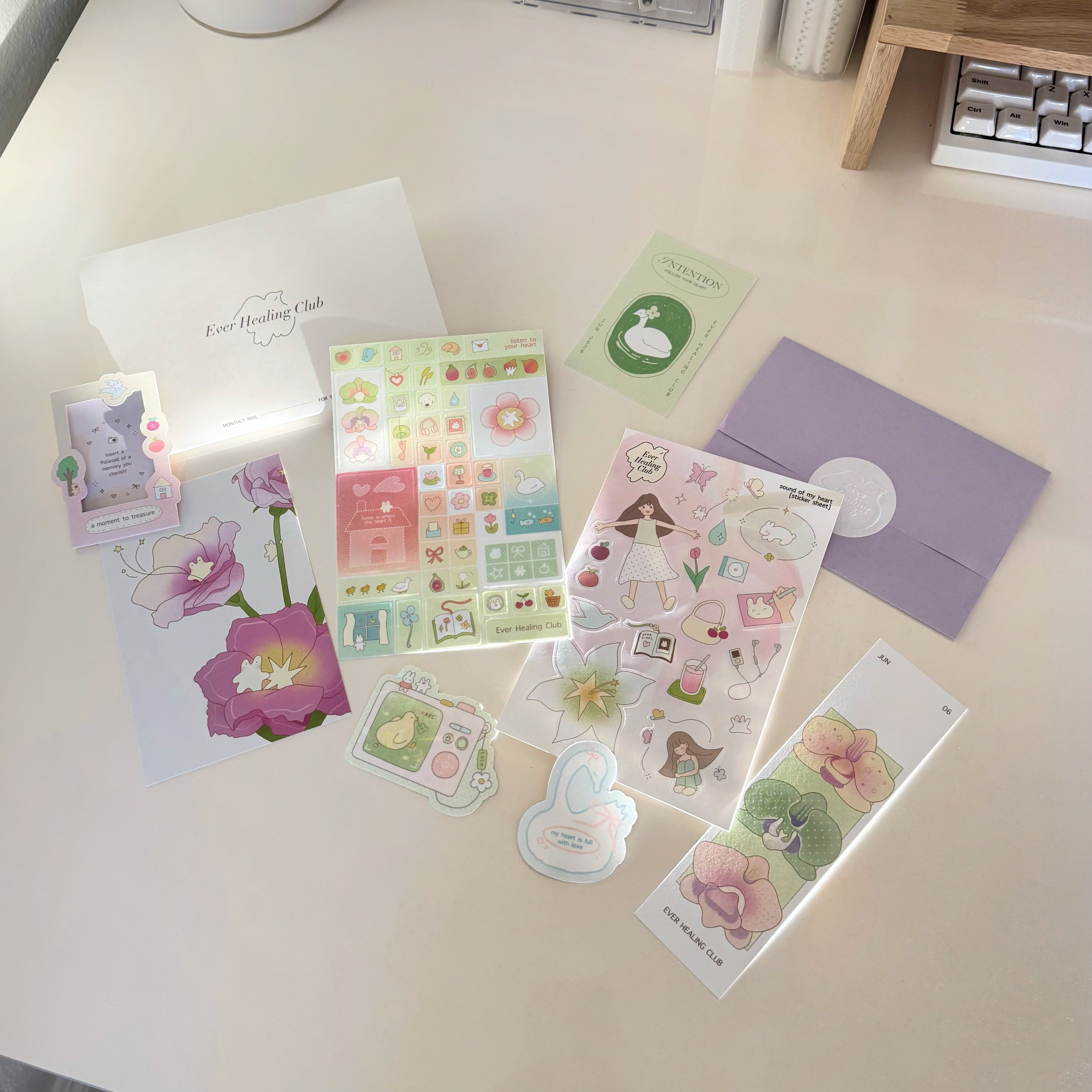 Ever Healing Club: June Signature edition with floral art and stationery