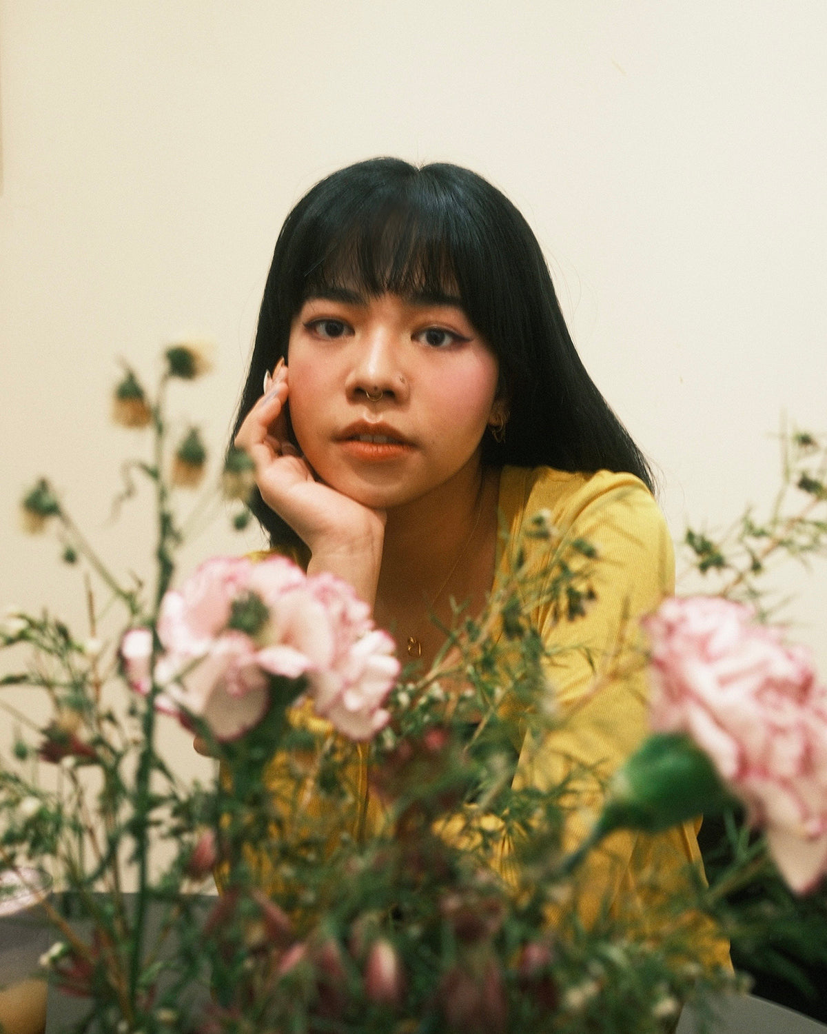 Alyanna Nebreja — official portrait among flowers