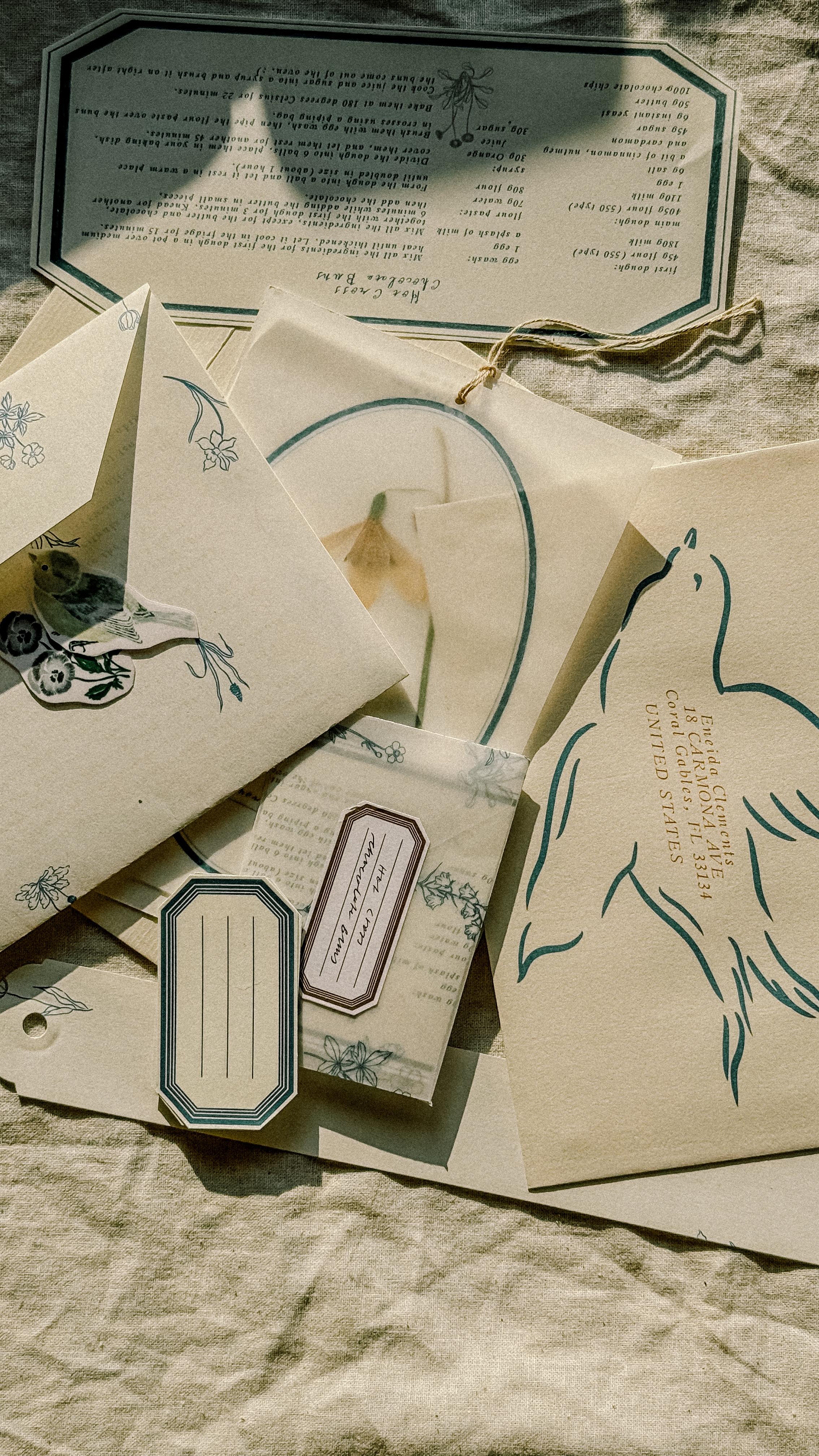 Meadow Letters: Close-up of bird stationery, translucent paper, labels, and a recipe