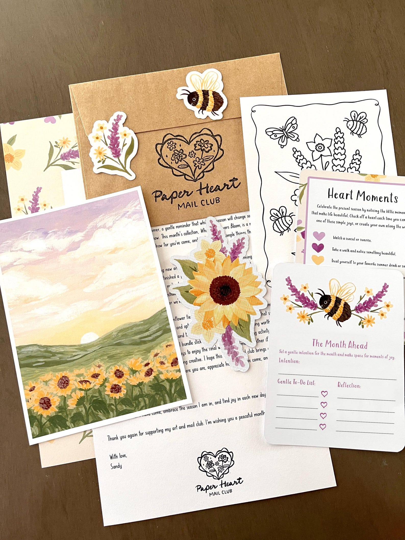 Paper Heart Mail Club — August single mail set with a sunflower print, bookmark, stickers, letter, and activity cards
