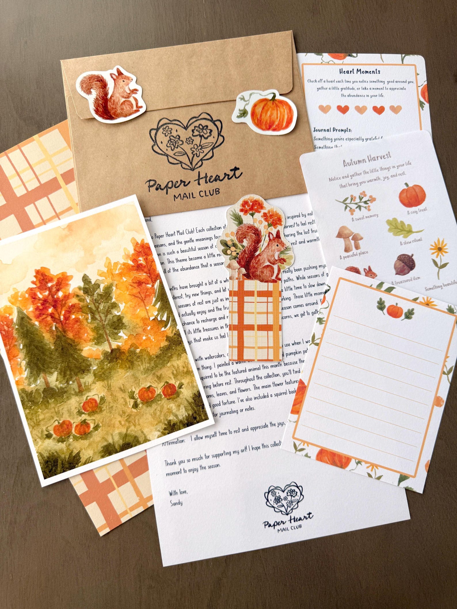 Paper Heart Mail Club — October Autumn Harvest single mail set with a landscape print, squirrel bookmark, stickers, letter, and activity cards