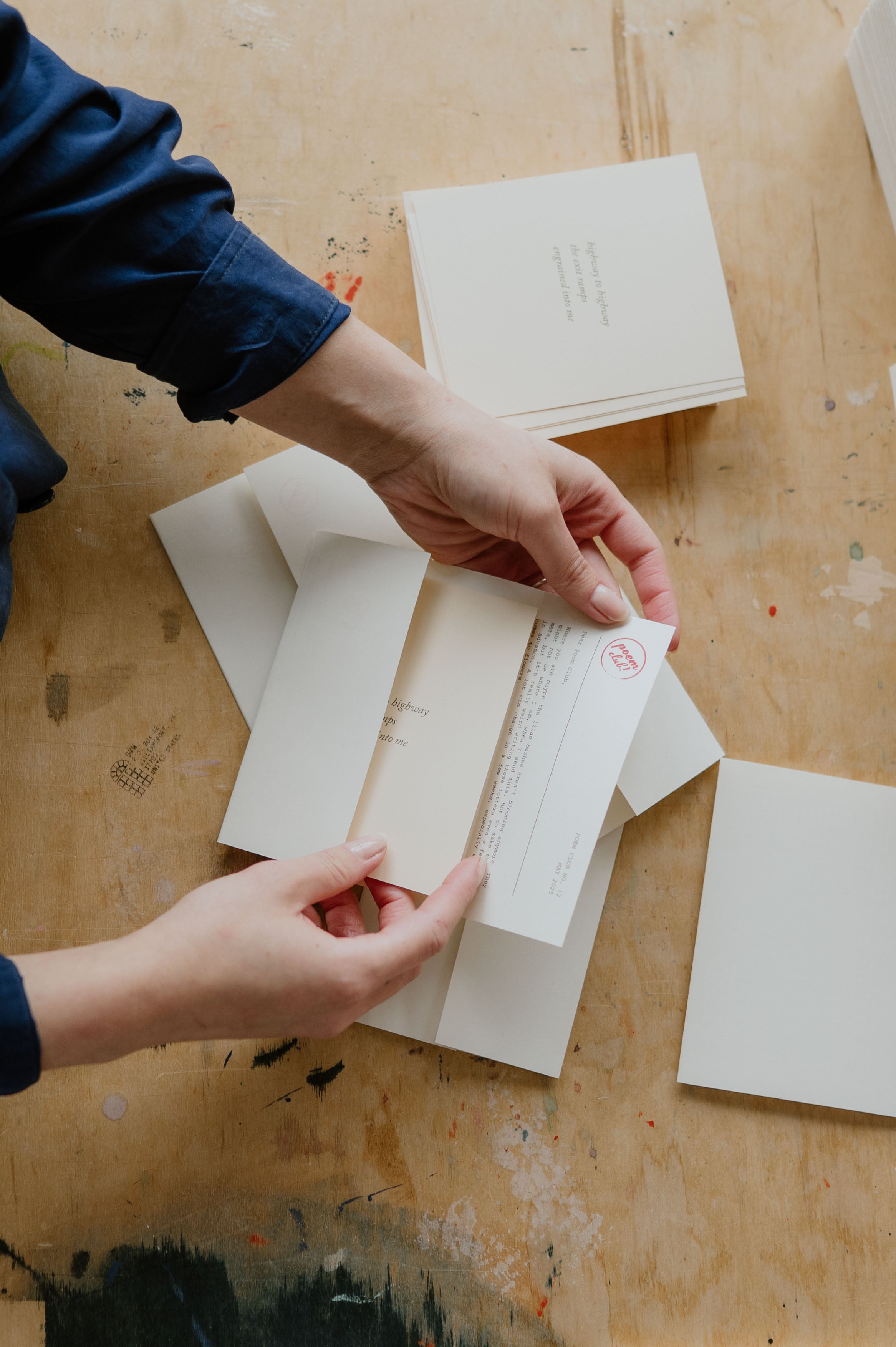 Preparing the March Poem Club poem and letter for mailing