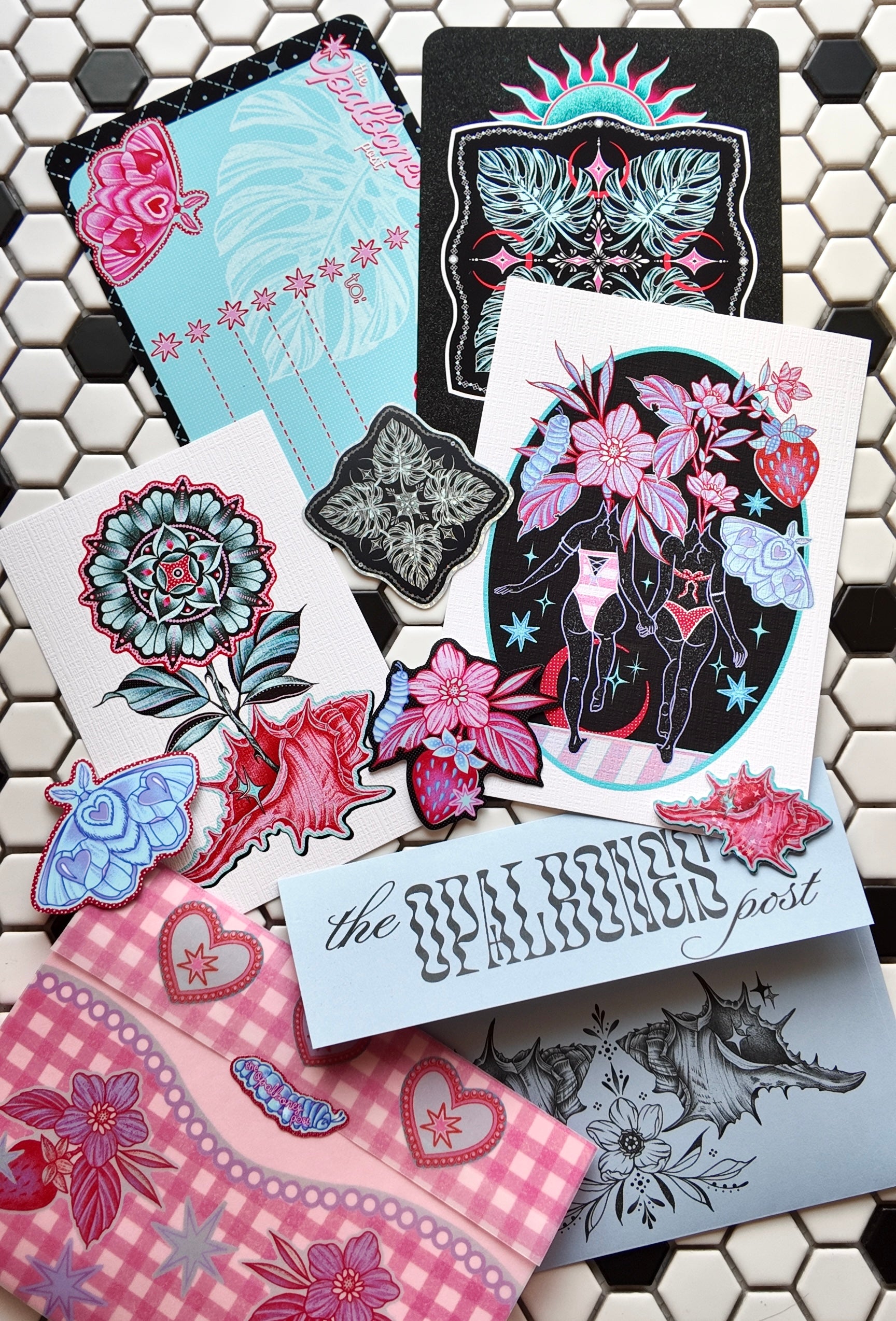 The Opalbones Post — July edition, July prints, stickers, and packaging