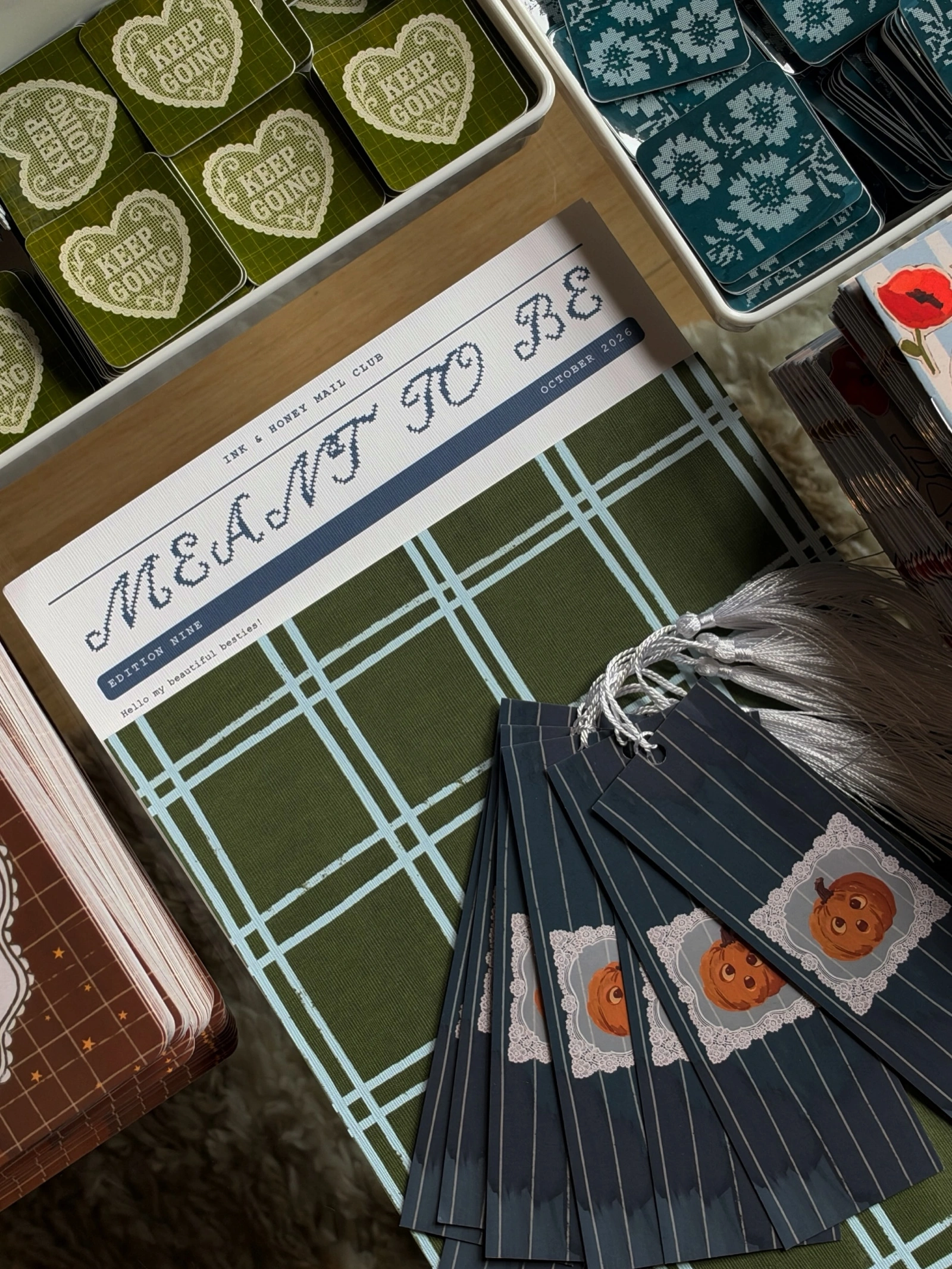 Ink & Honey — October essay, stickers, and bookmarks arranged for packing