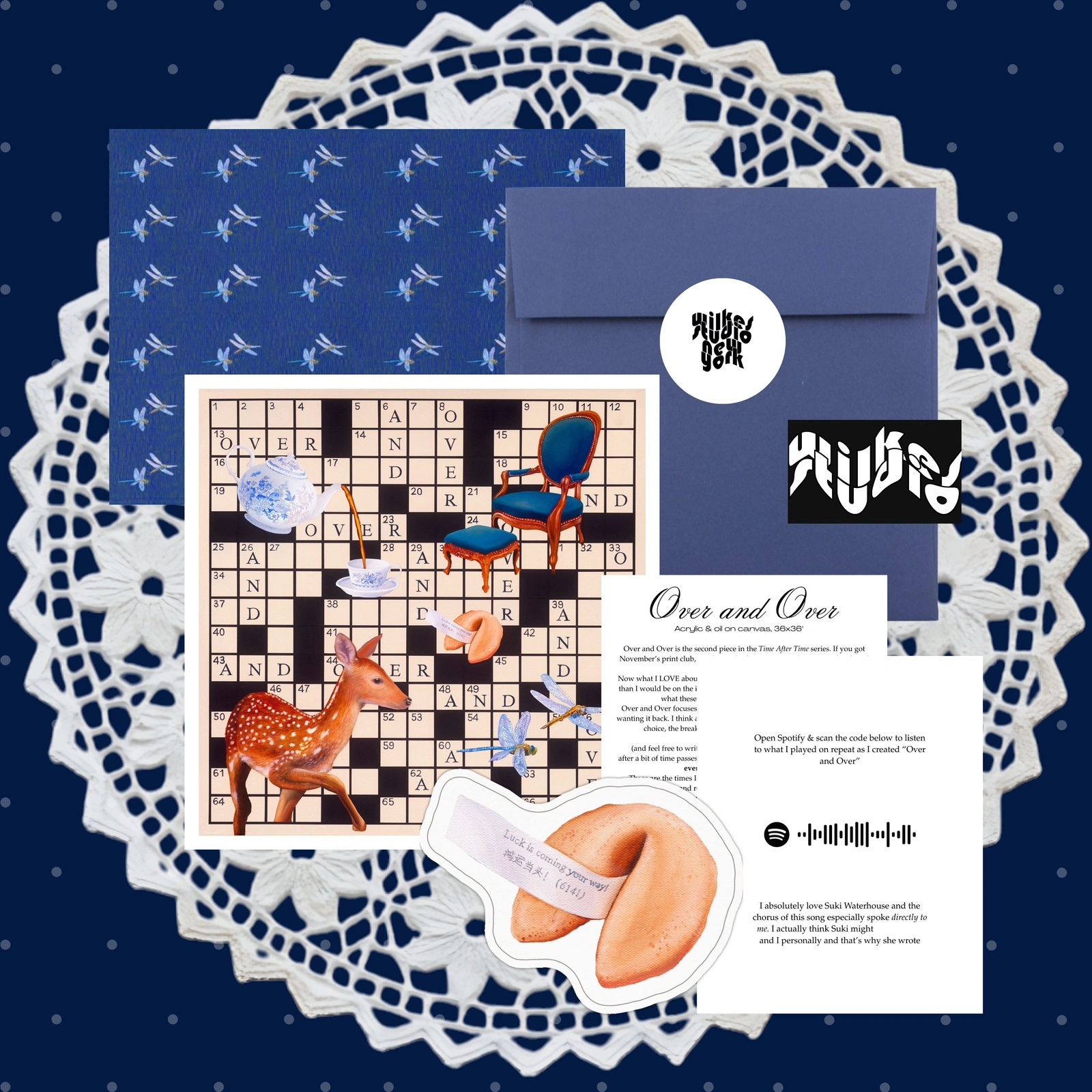 Wilkes Studio December 2025 mail with a lamp print, fortune-cookie sticker, letter and blue envelope